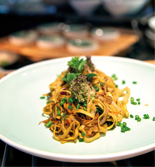  Plate of Asian noodles served on board a luxury river ship